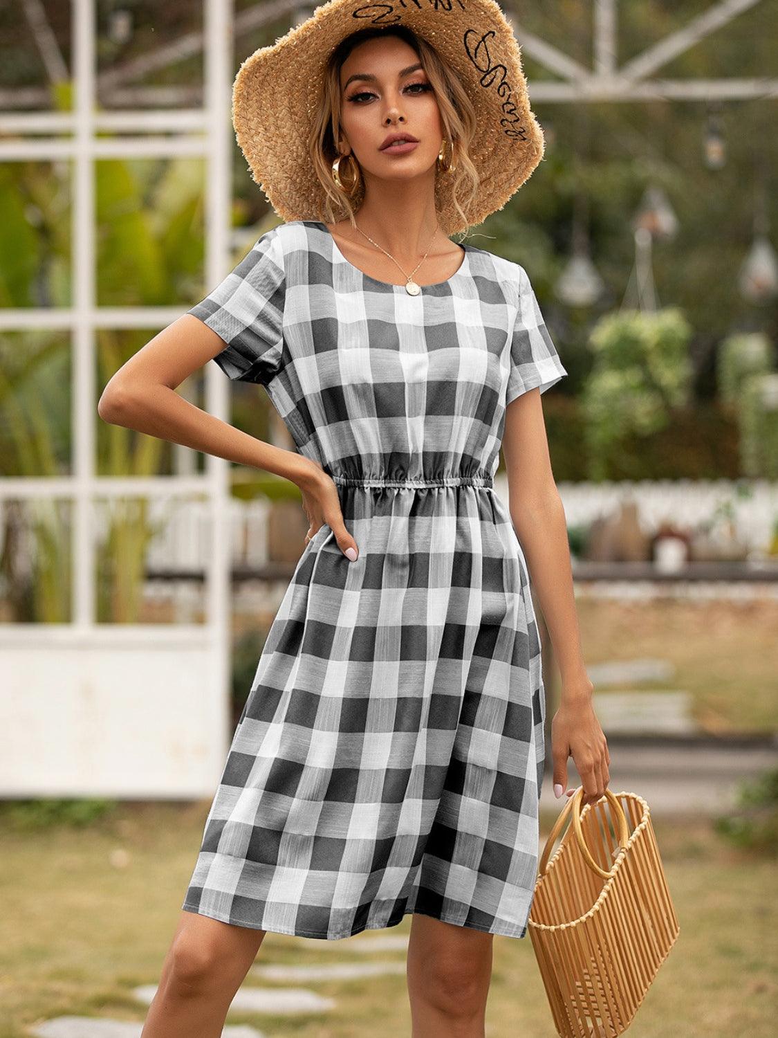 Smocked Plaid Round Neck Short Sleeve Dress Carauana Store