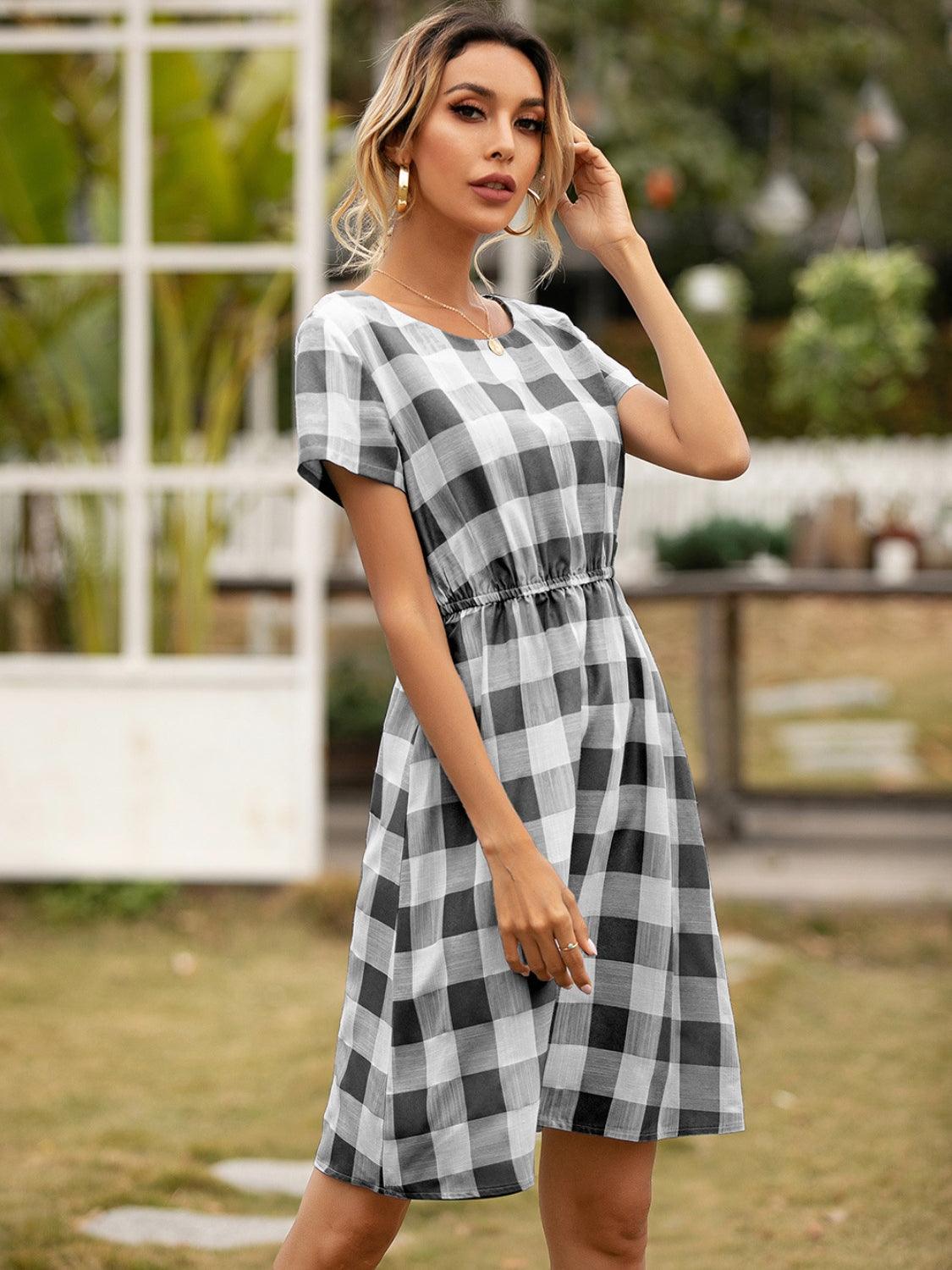 Smocked Plaid Round Neck Short Sleeve Dress Carauana Store