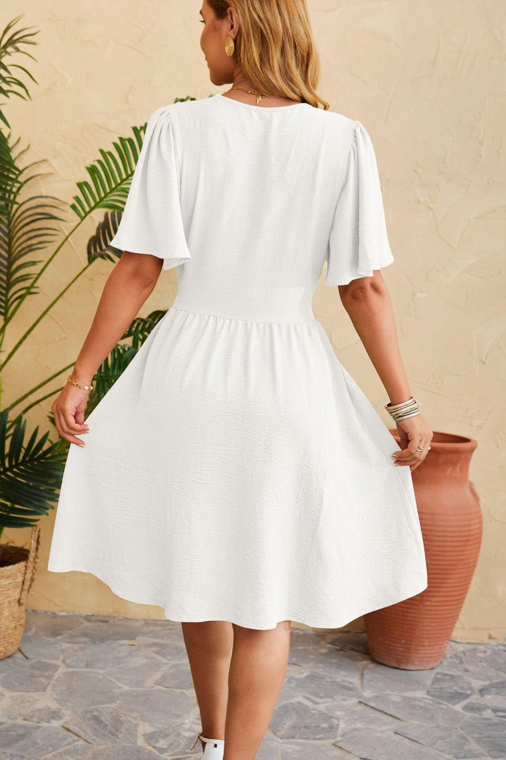 Ruched Surplice Short Sleeve Dress Carauana Store