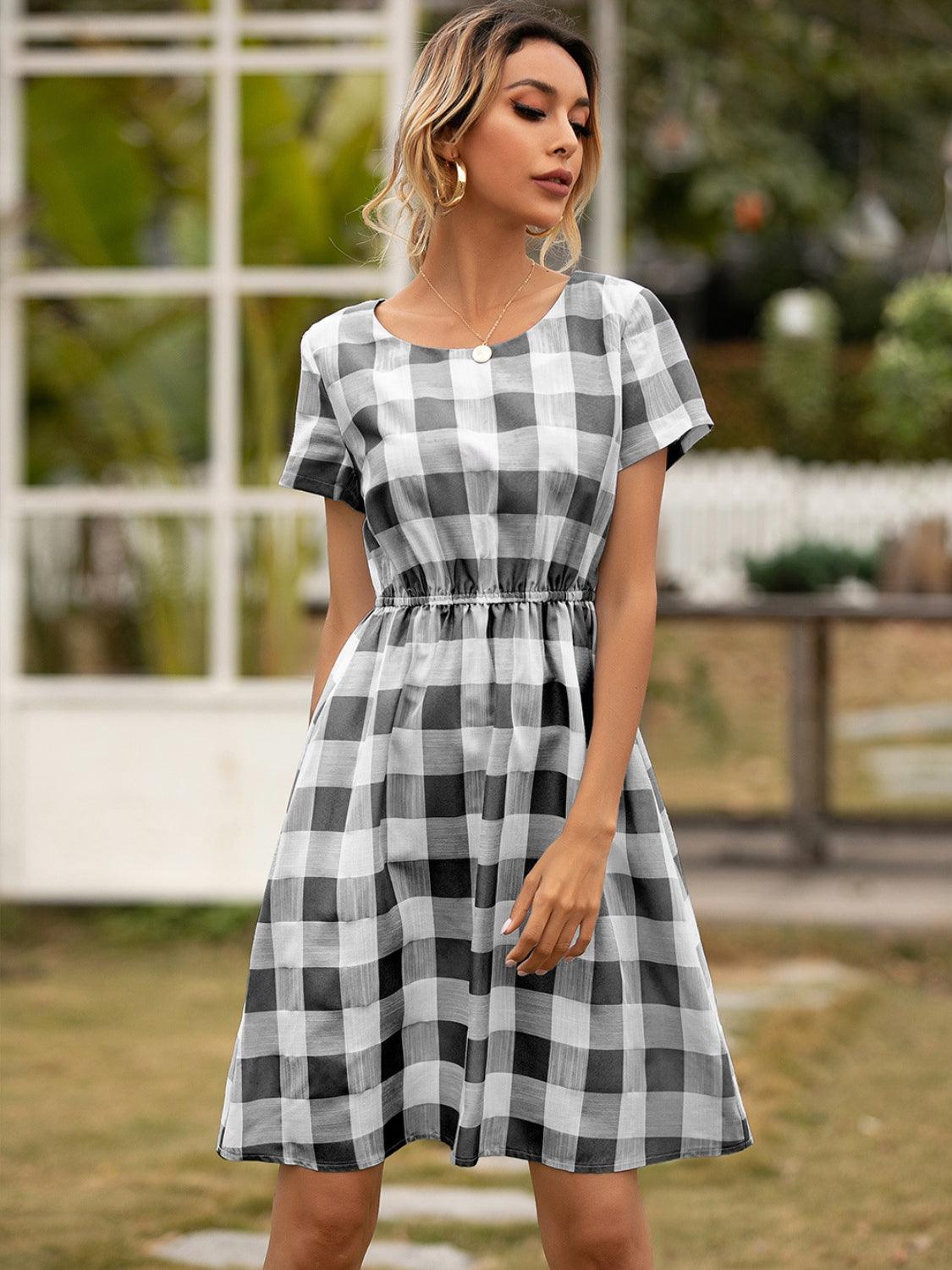 Smocked Plaid Round Neck Short Sleeve Dress Carauana Store