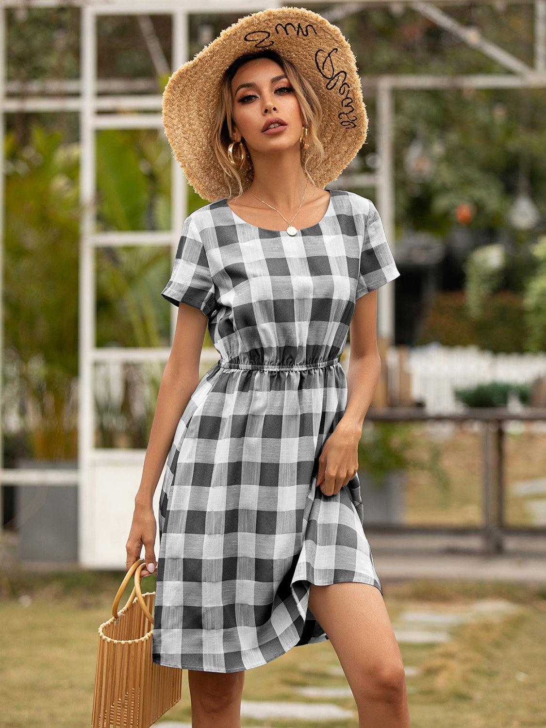 Smocked Plaid Round Neck Short Sleeve Dress Carauana Store
