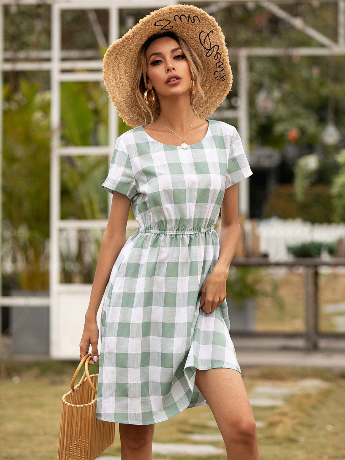 Smocked Plaid Round Neck Short Sleeve Dress Carauana Store