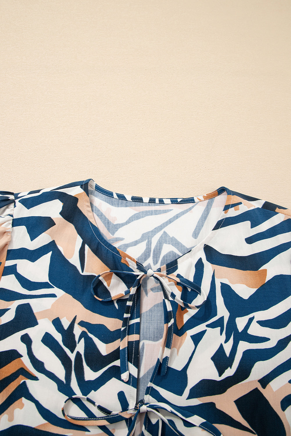 Blue Zebra Print Tied Front Puff Sleeve Top