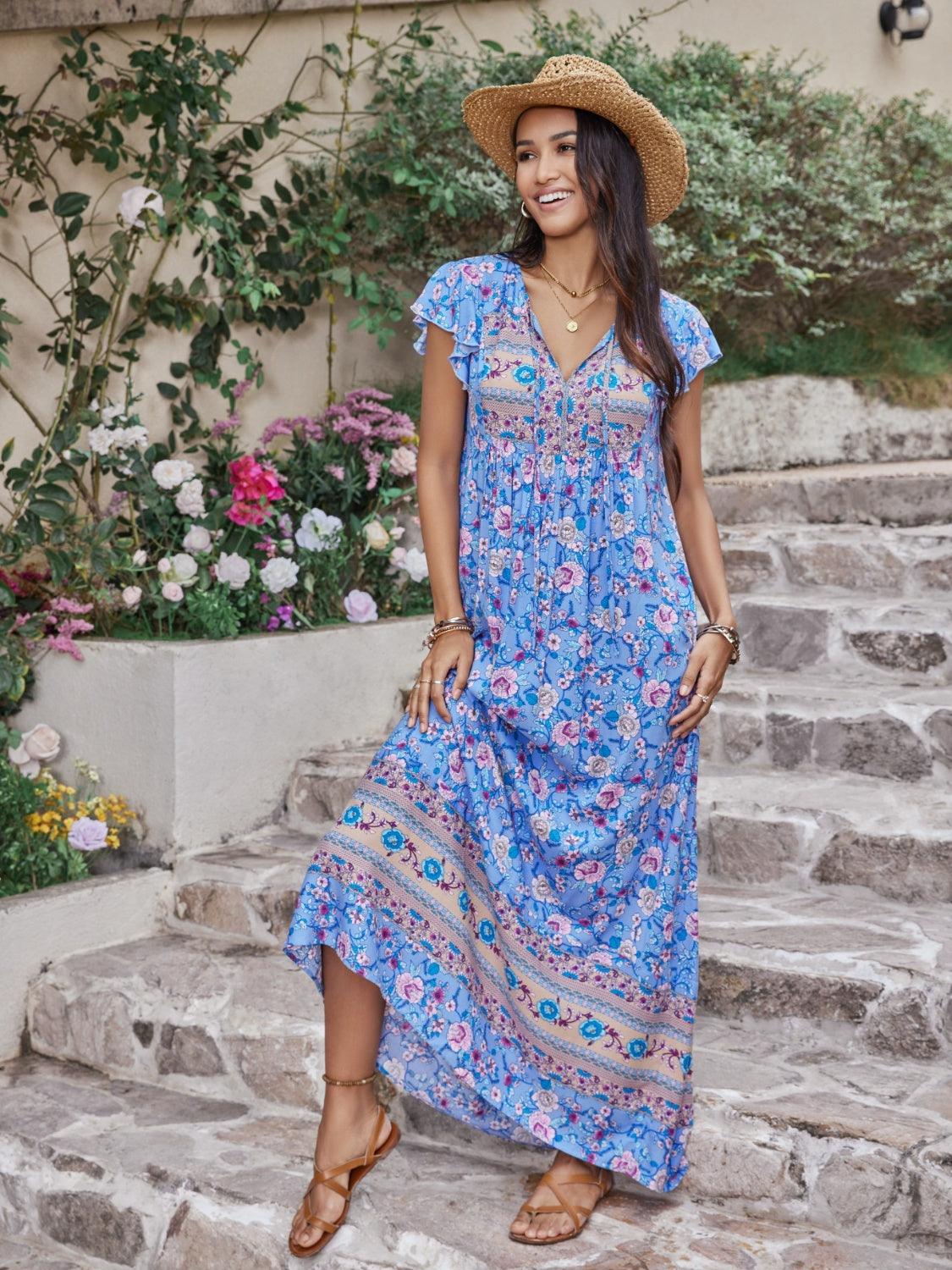 Ruffled Printed Tie Neck Cap Sleeve Dress Carauana Store