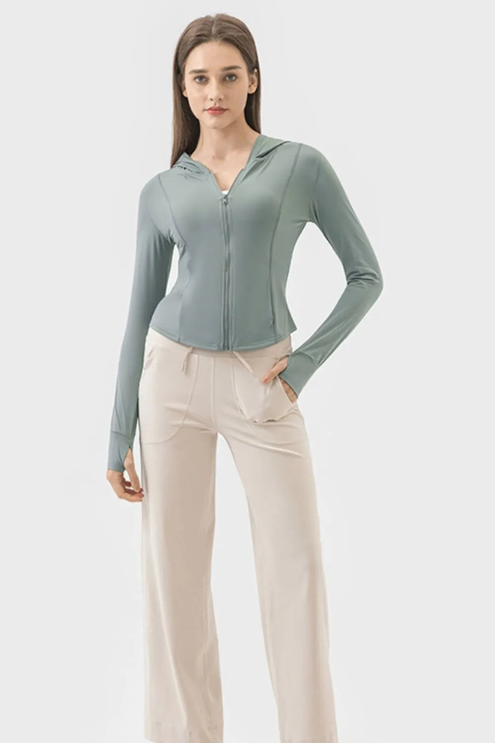 Millennia Pocketed Zip Up Hooded Long Sleeve Active Outerwear Carauana Store