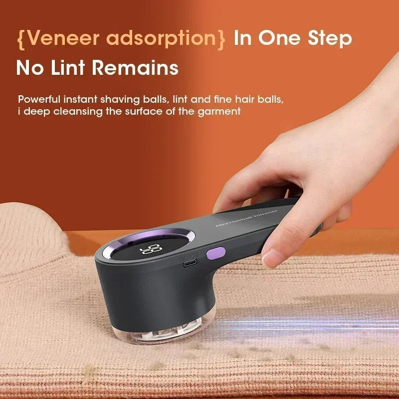 Hand holding a black grooming tool on a textured surface with text about veneer adsorption and no lint remaining.
