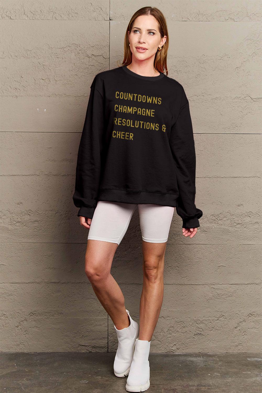 Simply Love Full Size COUNTDOWNS CHAMPAGNE RESOLUTIONS & CHEER Round Neck Sweatshirt Carauana Store