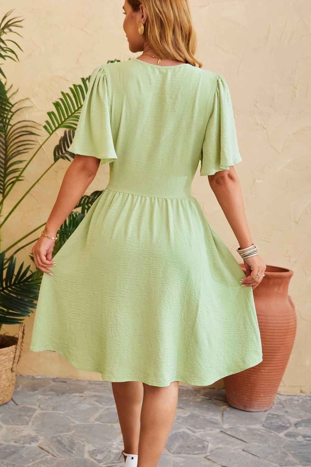 Ruched Surplice Short Sleeve Dress Carauana Store