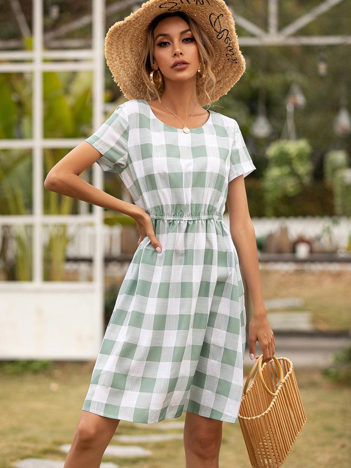 Smocked Plaid Round Neck Short Sleeve Dress Carauana Store