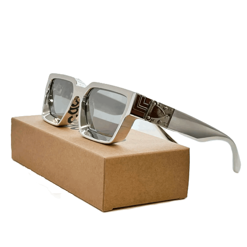 Carauana Millionaire GO with reflective lenses on a brown box