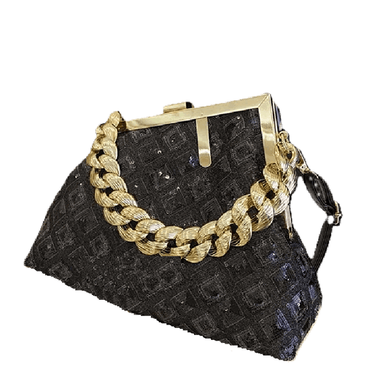 Black textured handbag with a gold chain detail on a white background