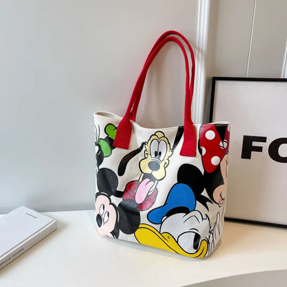 Colorful tote bag with cartoon characters on a white surface