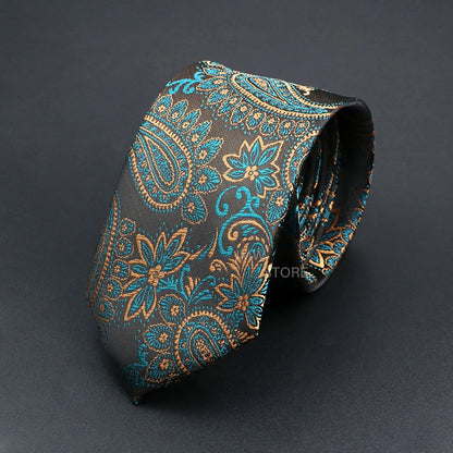Patterned tie with blue and gold design on a black background
