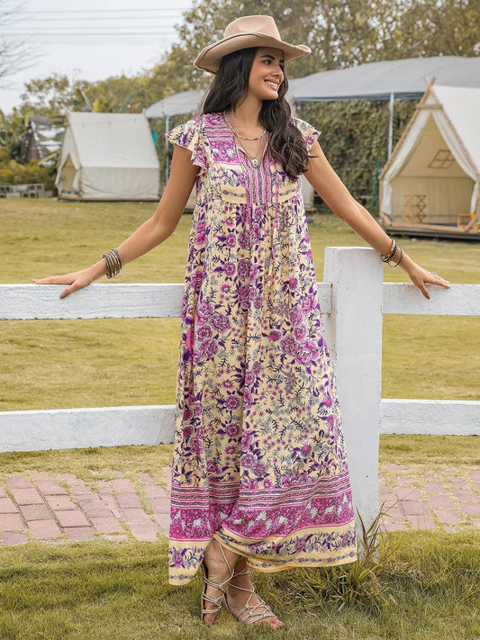 Ruffled Printed Tie Neck Cap Sleeve Dress Carauana Store